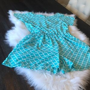 Romper with gold back zipper and front pockets